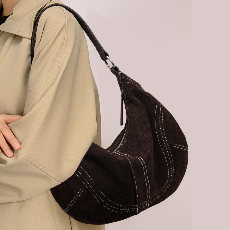 Aidanni Suède Onderarmtas van  - Half Moon Bag Suede recensie en prijs